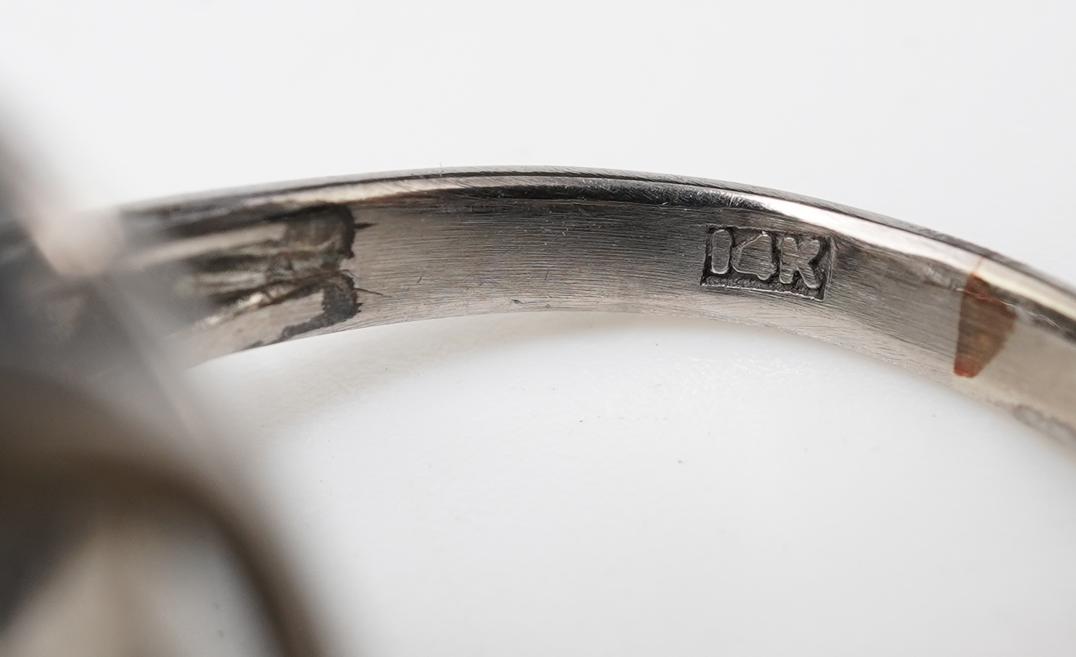 A jadeite and diamond ring